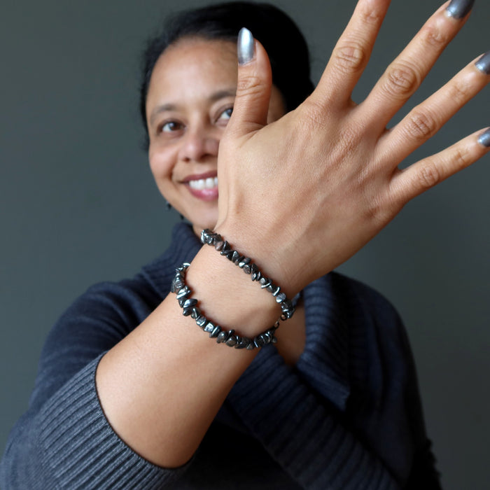 woman wearing two hematite bracelets