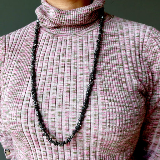 hematite necklace on woman