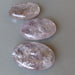3 translucent purple oval polished palm stones