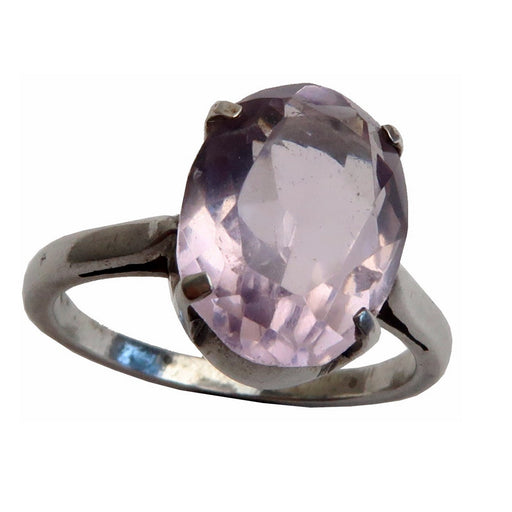 faceted oval amethyst gemstone in silver ring