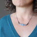 angelite cloud necklace on female neck