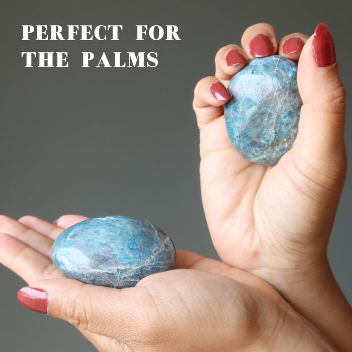 hand holding rocky blue apatite palm stones