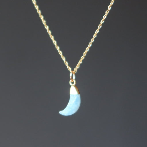 aquamarine crescent moon pendant on gold necklace