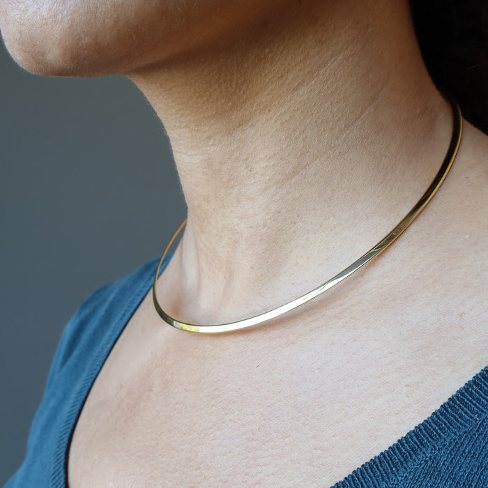 model wearing Gold plated brass Neckwire choker necklace