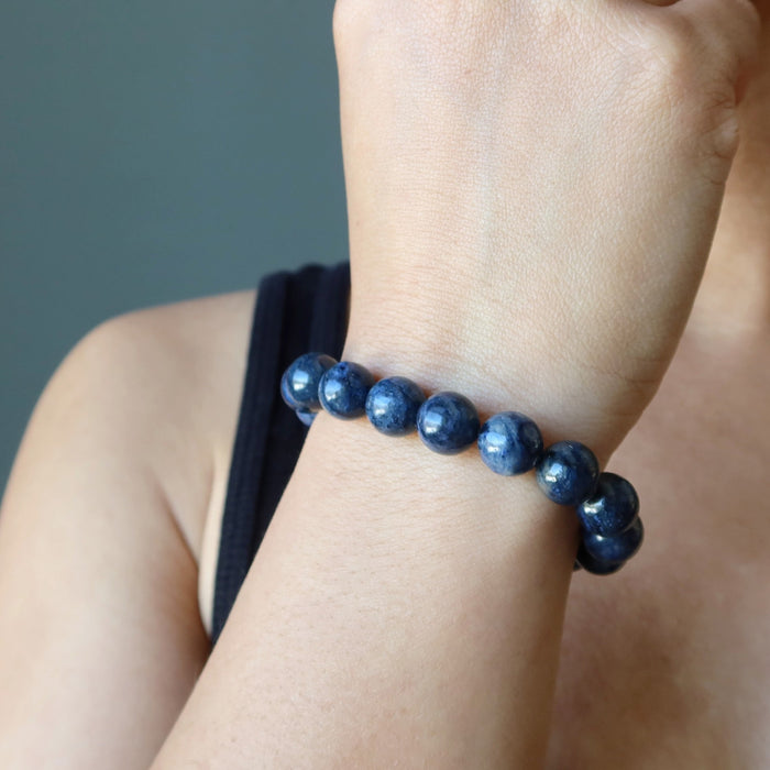sheila of satin crystals wearing blue Dumortierite Bracelet 