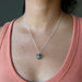 sheila of satin crystals wearing Rainbow Fluorite heart shape pendant