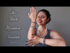 video on wearing black moonstone round beaded stretch bracelets