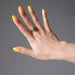 hand wearing nephrite jade gold ring