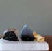 obsidian, hematite, smoky quartz, selenite slab, palo santo