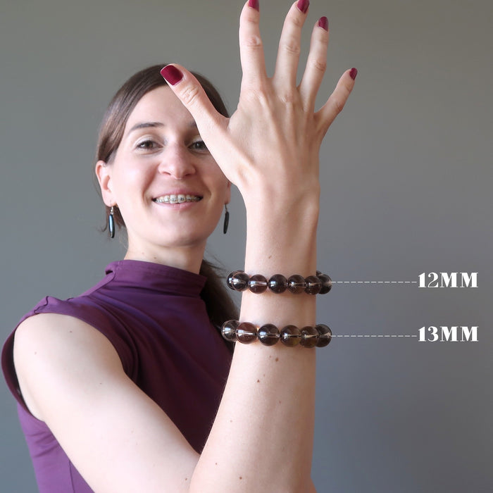 female model wearing different size bead Smoky Quartz Bracelets