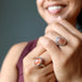 sheila of satin crystals wearing Sunstone Rings on both hands 