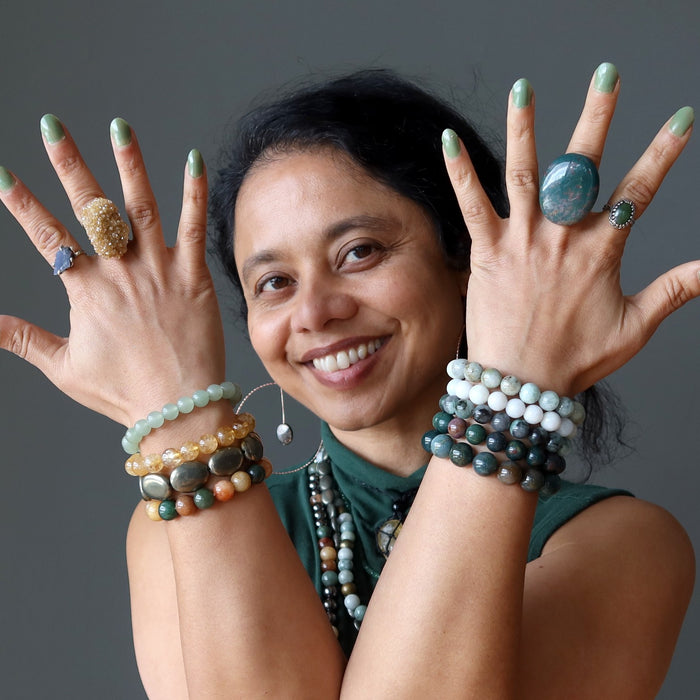woman wearing abundance crystal jewelry