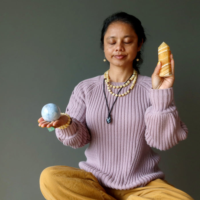woman meditating with calcite