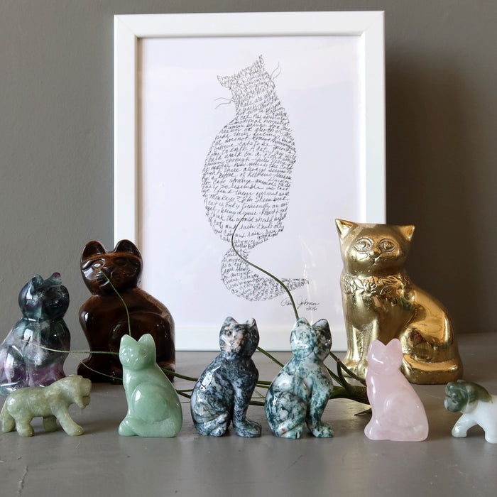 cat figurines and drawing