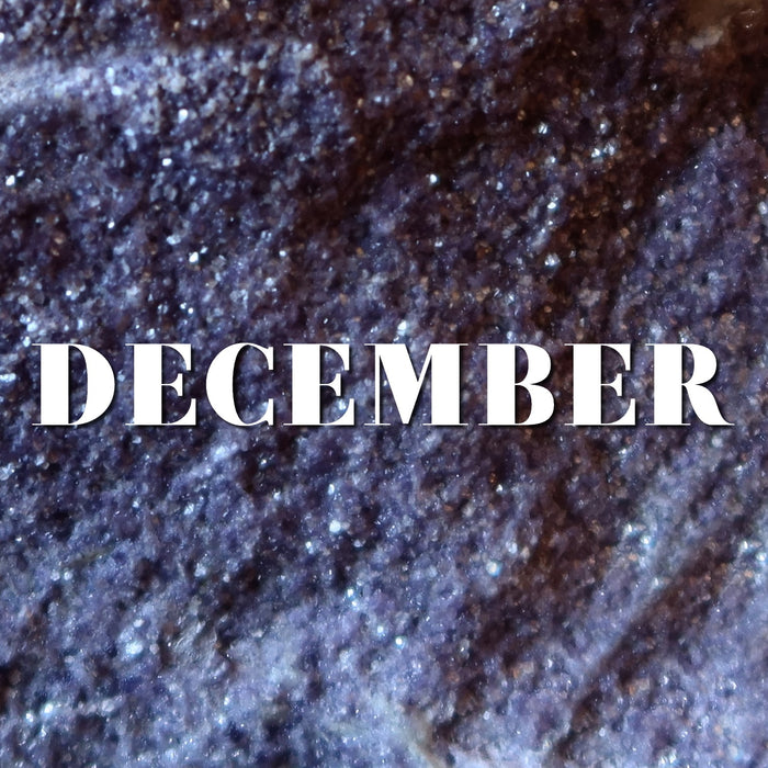 lepidolite background with word december