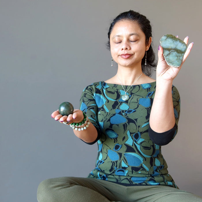 sheila of satin crystals meditating with jade slab and ball
