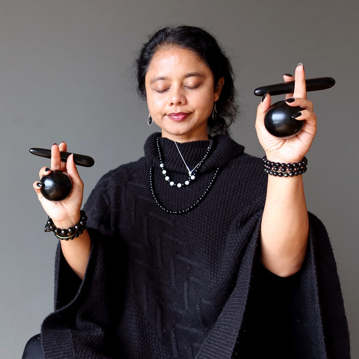 sheila of satin crystals meditating with jet wands and spheres
