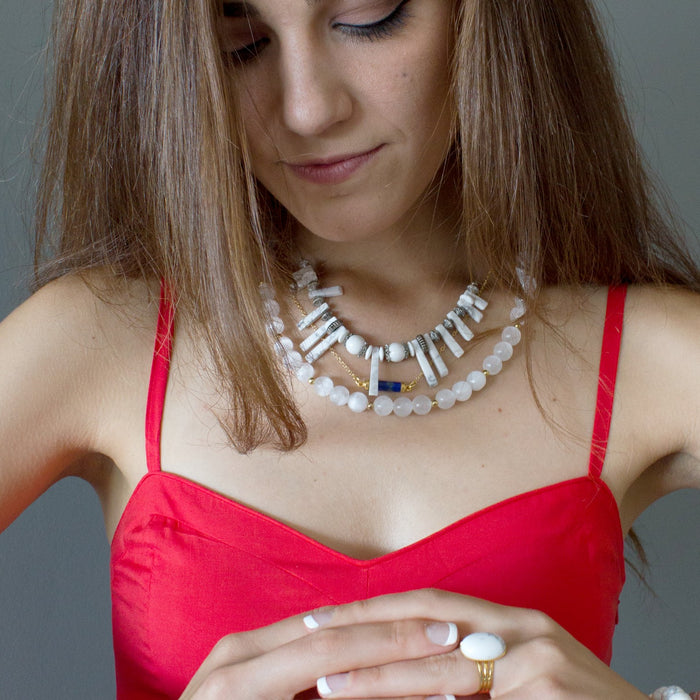woman wearing crystal jewelry