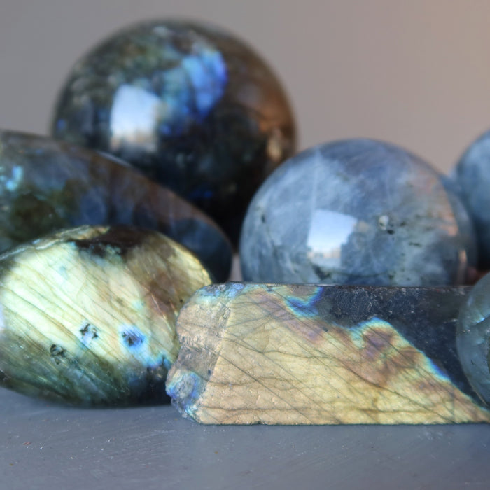 pile of labradorite stones and spheres