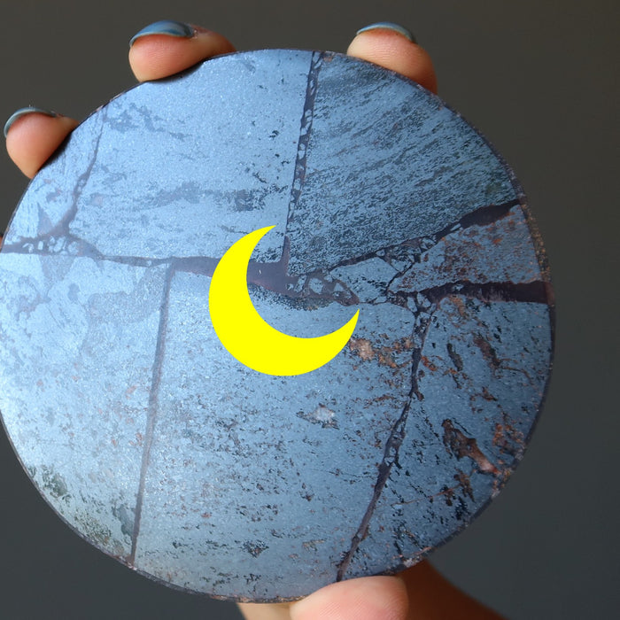 hematite round slab with new moon image