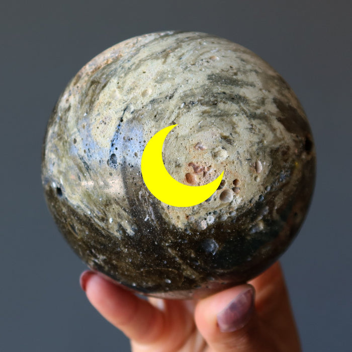 zhamanshin impactite sphere with new moon image
