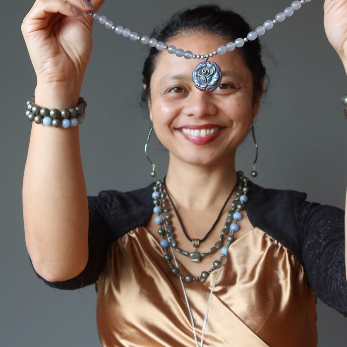 sheila of satin crystals wearing pyrite jewelry