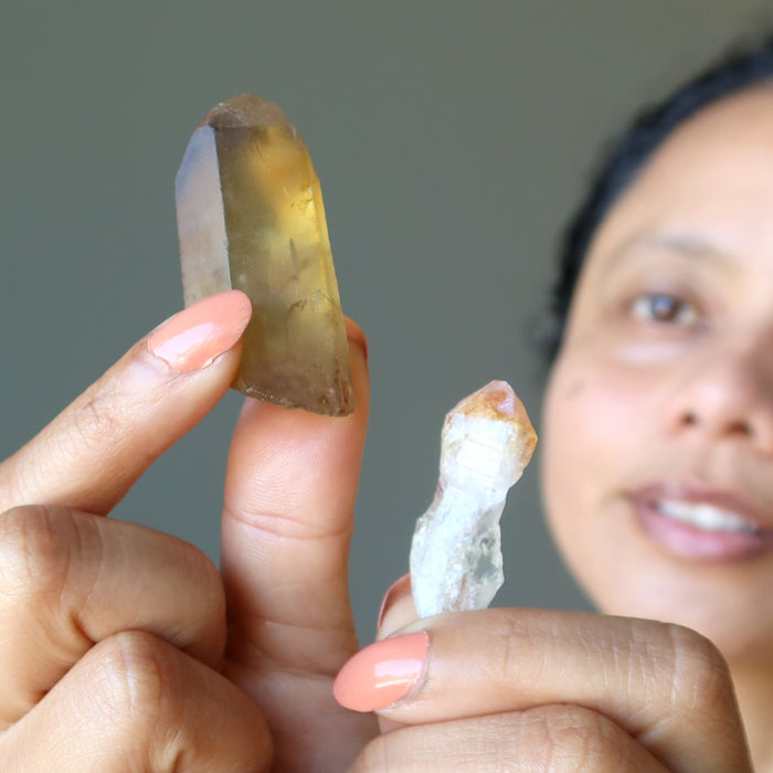sheila of satin crystals holding real and heat treated citrine points