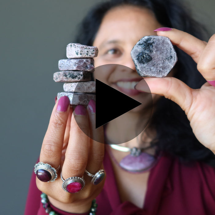 sheila of satin crystals holding ruby stones