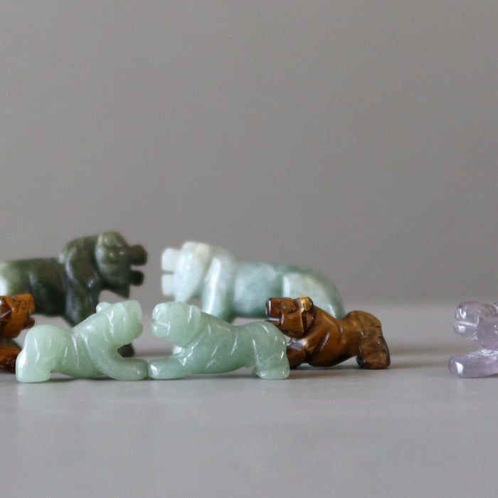 green aventurine, jade, purple amethyst, brown tigers eye tiger figurines