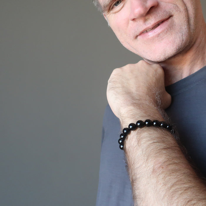 male modeling black tourmaline bracelet