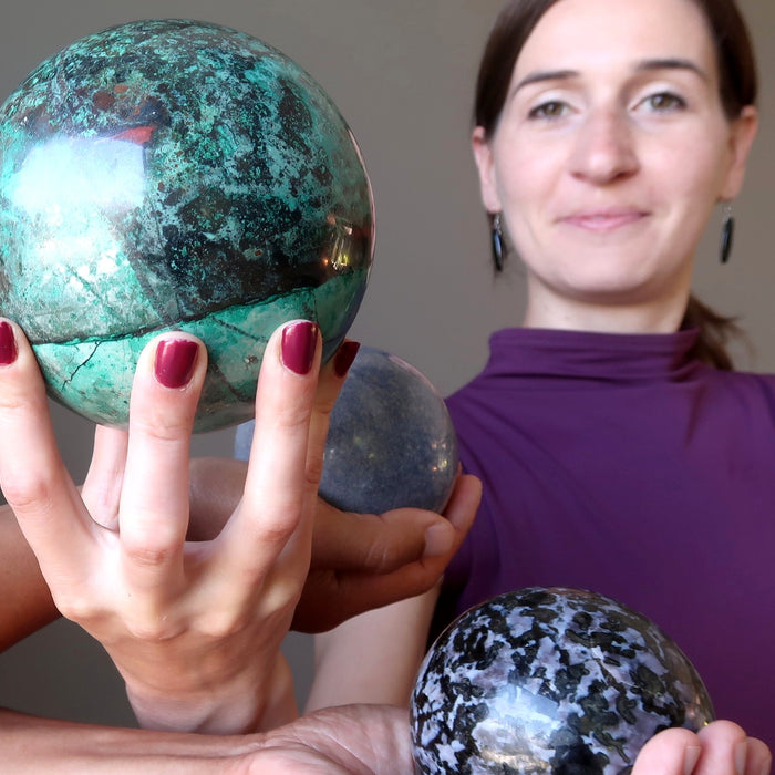 woman with three crystal balls
