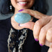 blue aquamarine tumbled stone at throat chakra