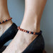 blue and brown goldstone anklets