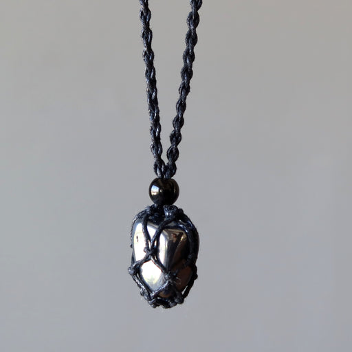 hematite tumbled stone in macrame necklace