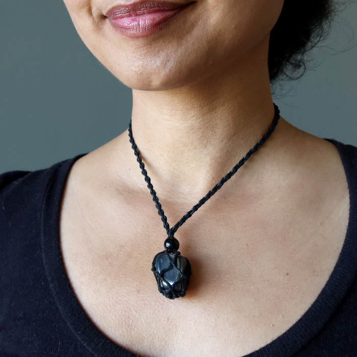 woman wearing hematite necklace