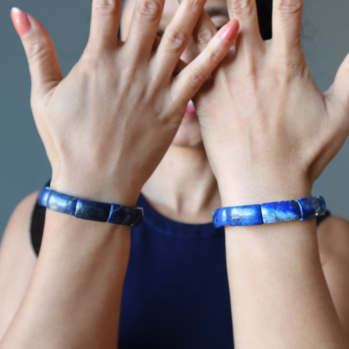 two lapis lazuli stretch bracelets on wrists
