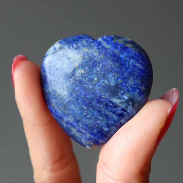lapis lazuli worry stone heart in hand