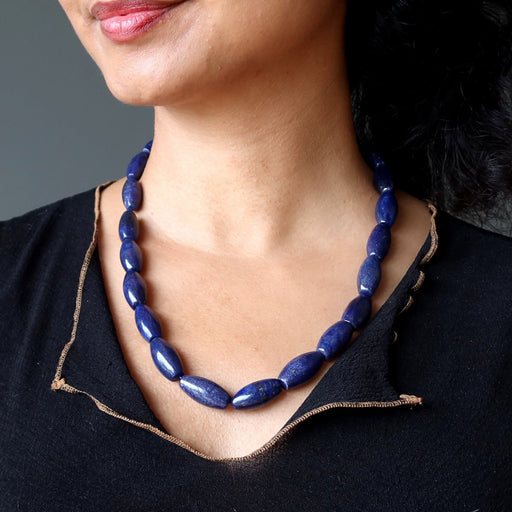 lapis beaded necklace on woman