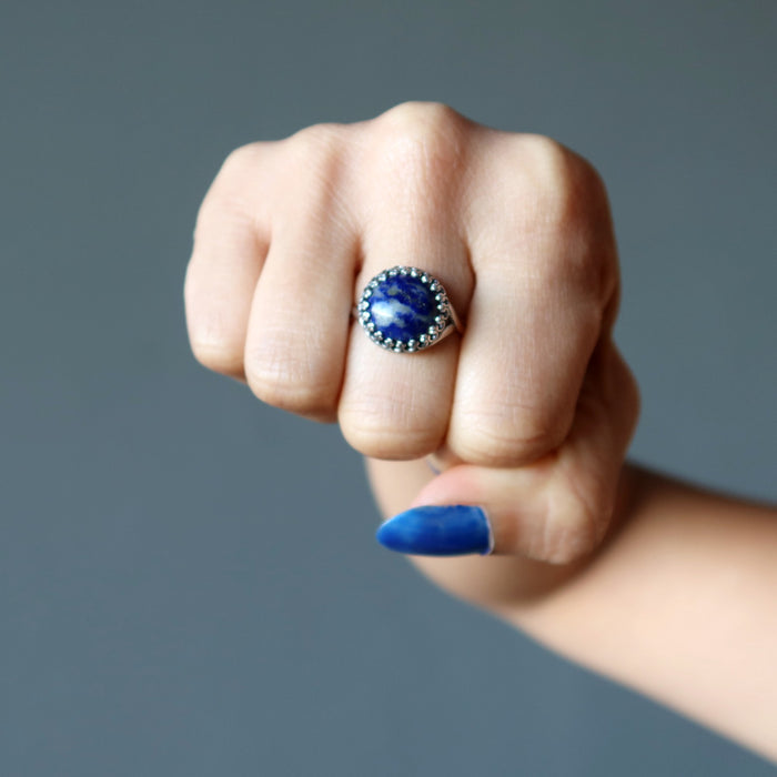 lapis lazuli sterling silver ring on fist