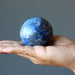 denim lapis sphere in hand