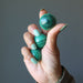 bullseye malachite spheres in hand