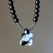 back of snowflake obsidian turtle necklace