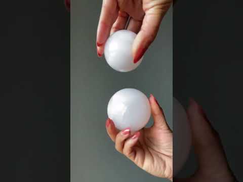 video on pink calcite sphere