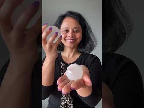 video on white selenite sphere