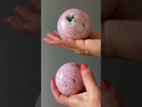 video on rhodonite geode sphere