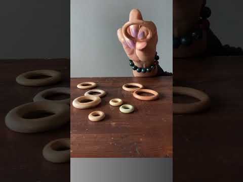 video on wood ring stands