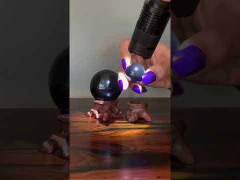 video on purple obsidian sphere