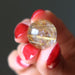 golden rutilated quartz sphere