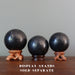 shungite spheres on display stands