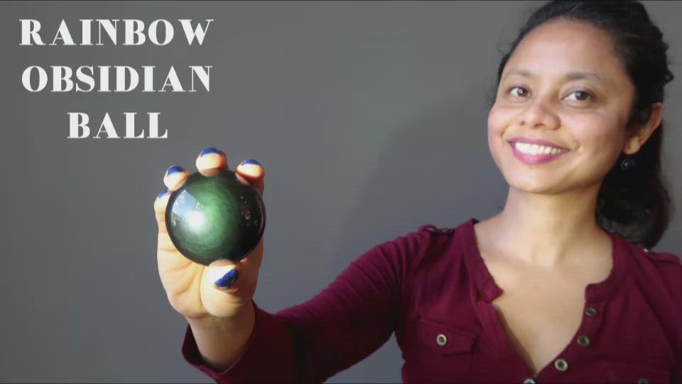 video on green rainbow obsidian ball